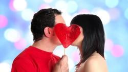 couple young shy lollipops heart shaped kiss