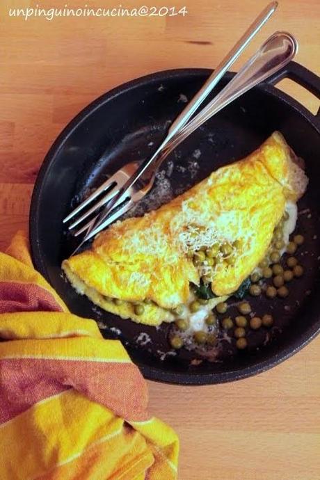 Omelette con piselli, formaggio di capra e menta