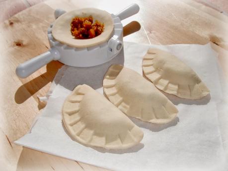 Ravioli di semola con zucca e salsiccia