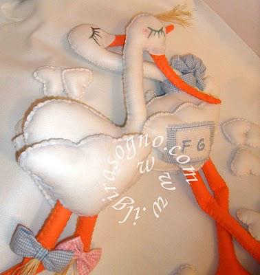 2011 Nuovi work in progress ..cake topper cicogne nascita e segnaposti