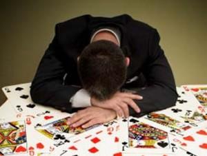 Businessman at Card Table