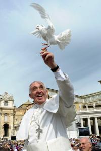 Pope Francis holds a dove before his Wednesday general audience at Saint Peter's Square at the Vatican