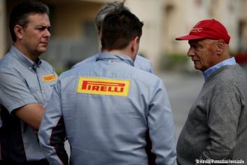 Paul Hembery (middle - Pirelli Motorsport Director) and Mario Isola (left - Pirelli Racing Manager) are talking to Niki Lauda