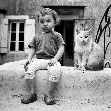 child and cat