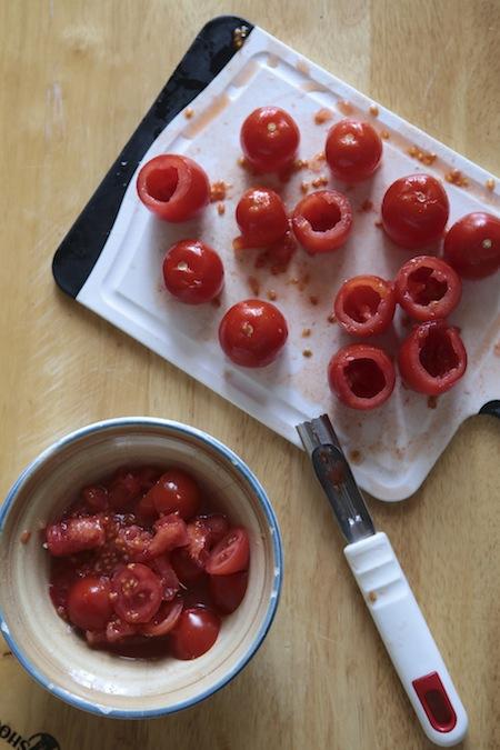 pomodorini svuotati nella ricetta finger food: pomodorini, sedano rapa e colatura di alici