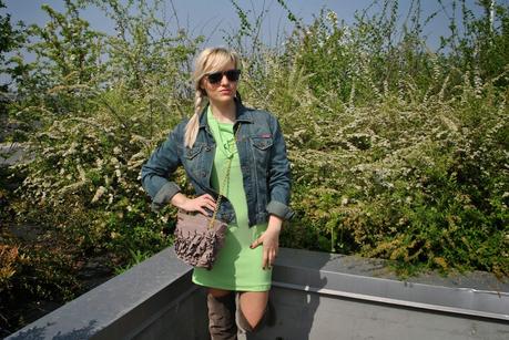 A GREEN DRESS AND A DENIM JACKET