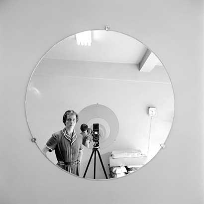 FVM_VM Self Portrait Round Mirror Repeating Image_©Vivian Maier_Maloof Collection