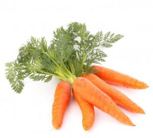 Carrot vegetable with leaves isolated on white background cutout