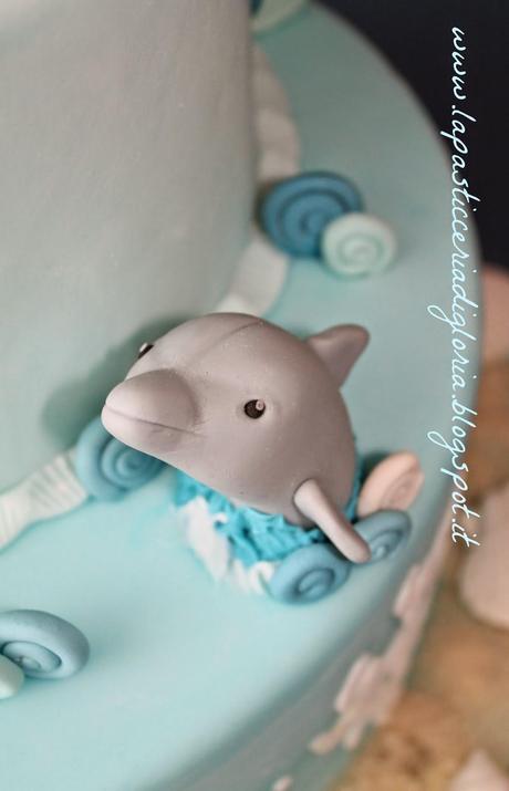 Una tenera torta con delfini