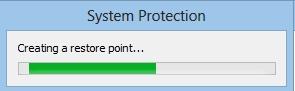 Finestra Protezione sistema, con una barra di avanzamento relativa alla creazione di un punto di ripristino