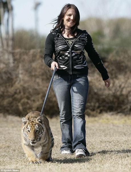 Felicia, who is homeschooled, has fed, walked and cared for the cub since he was born as his mother, a first-time mum, didn't know what to do