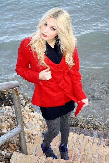 red coat & blu heeled shoes