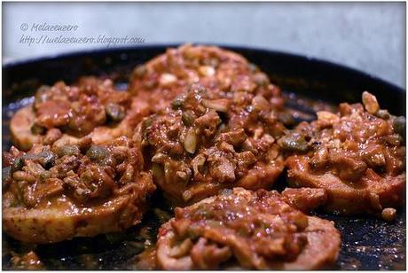 Medaglioni di merluzzo con capperi e trito di noci e mandorle