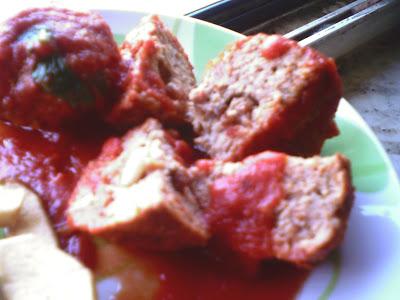 E purpette ca sarza  ( polpette al sugo )