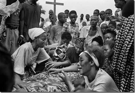 photo by Kadir van Lohuizen / NOOR

Diamond matters 2004
Funeral of a miner. Many miners die, because they drown or sand walls collapse, Mbuij Mayi, DR Congo