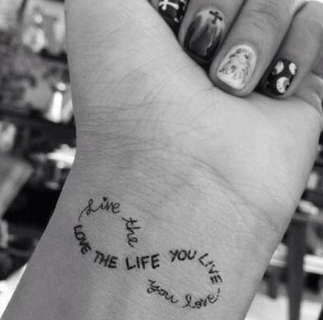 infinity meaningful love tattoo quote on wrist - love the life you live-f92410