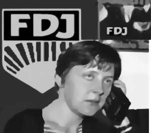 Angela Merkel pochi mesi prima della caduta del muro durante un incontro dei dirigenti della Freie Deutsche Jugend, organizzazione giovanile comunista