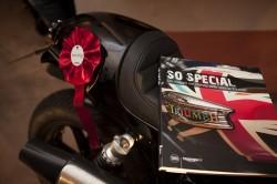 La moto vincitrice con il libro So Special edito da Skira