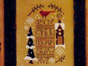 Schema punto croce Natale- sampler uccellino rosso sulla neve