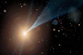 Rappresentazione artistica di un buco nero supermassiccio con un getto di particelle e fotoni espulso con velocità prossime a quella della luce. Solo una frazione dei buchi neri possiede un getto e questo può essere puntato in qualunque direzione. Se Un getto è orientato in direzione della Terra, l'oggetto celeste da cui proviene è chiamato blazar. Crediti: NASA/JPL-Caltech