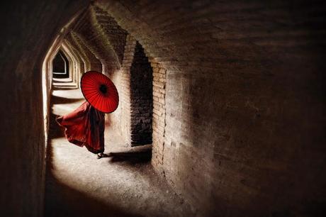 Manuel Librodo/www.tpoty.com Mandalay, Myanmar Monk walking in the hallways of Maha Aungmye Bonzan Monastery.