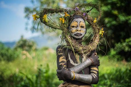 SergioCarbajoRodriguez/www.tpoty.com Regia Village, Kibish. South Ethiopia Portrait of a young Suri tribe boy in Regia Village, Kibish.