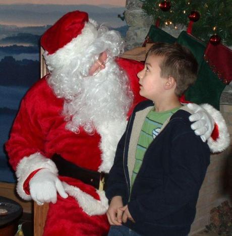 Santa_with_boy_5100645240-640x652