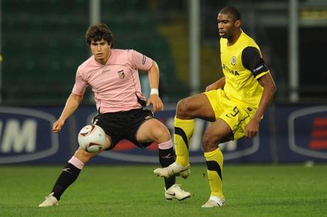 Ezequiel Munoz Ezequiel Munoz (L) of Palermo and Leony Leonard Kweuke of Sparta Prague compete for the ball during the Uefa Europa League Group F match between Palermo and Sparta Prague at Stadio Renzo Barbera on December 2, 2010 in Palermo, Italy.