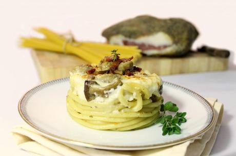 Timballo di pasta funghi e guanciale croccante