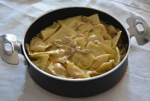 ravioli di zucca con salsiccia funghi e fondutina