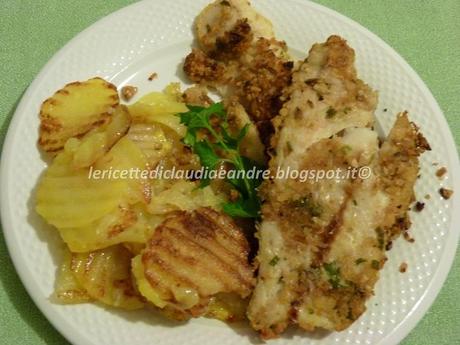 Merluzzo al forno, con panatura croccante alle noci e patate fritte