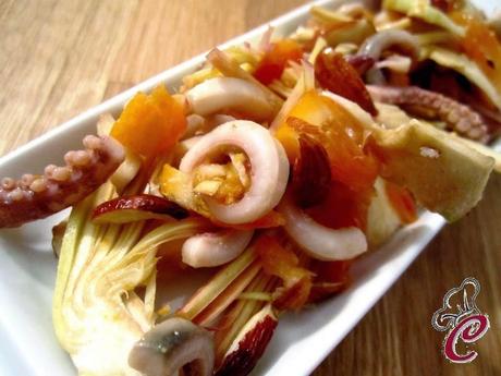 Insalatina di totani con carciofi, arancia e nocciole: il carattere che fa da cornice e arriva al cuore