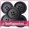 2 bottoncini neri