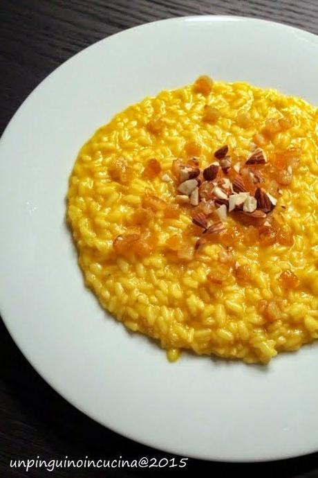 Risotto alla milanese con arancia candita e mandorle croccanti 