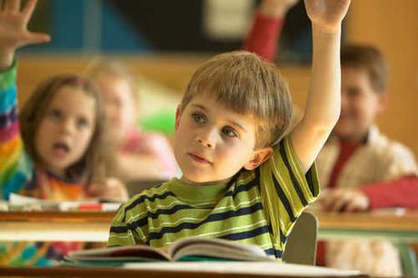 Students with Raised Arms in Classroom