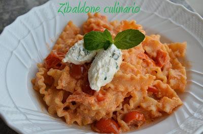 Mafaldine al pomodoro di Pachino con quenelle di ricotta al Parmigiano