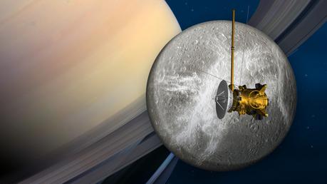 Cassini e Dione in una rappresentazione artistica. Crediti: NASA/JPL-Caltech