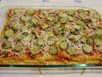 Pasta al forno con pomodoro e zucchine con fiori