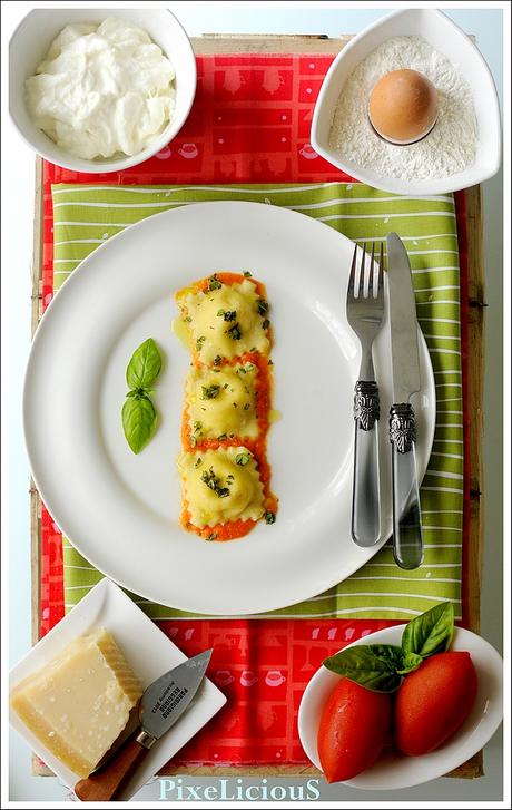 Ravioli Ripieni di Parmigiano Reggiano e Stracciatella di Bufala su Crema di Pomodori Freschi