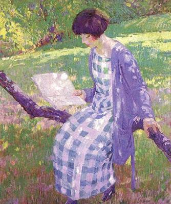 L'estate in giardino: una poltrona, un parasole e, ovviamente, un buon libro!