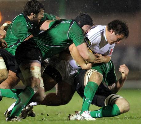 Aironi's Alberto DeMarchi is hauled down by the Connacht defence