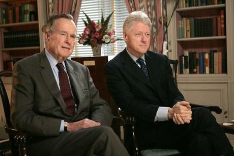 Clinton with former President George H. W. Bush in January 2005