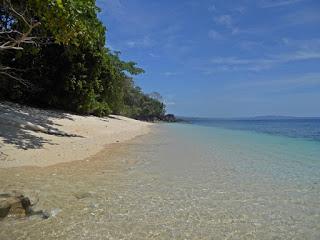 Pulisan, Pantai Besar, spiaggia bianca con fondali per diving e snorkeling