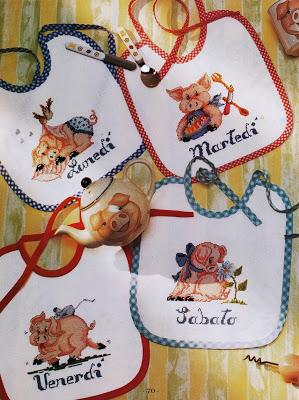 Bavaglini con porcellini da ricamare a puntoincroce