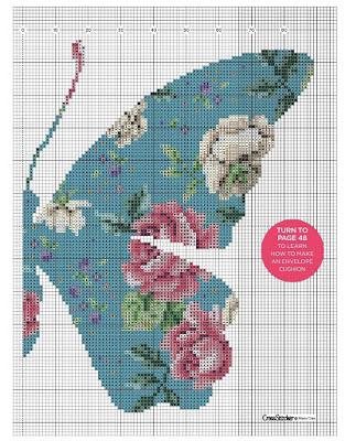 Bellissimo cuscino a puntocroce con farfalla