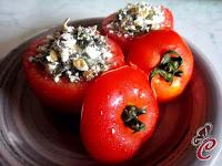 Pomodori farciti di feta e noci con fiocchi d'avena: il silenzio della partenza e l'occasione per il ritorno