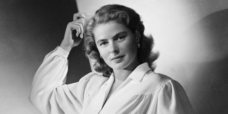 1946:  Film star Ingrid Bergman (1915 - 1982) wearing a blouse with full sleeves gathered to tight cuffs, a broad belt and soflty draped skirt.  (Photo by Ernest Bachrach/John Kobal Foundation/Getty Images)