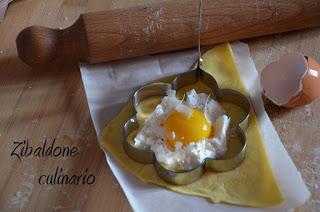 Ravioli al tuorlo fondente con burro e pistacchi