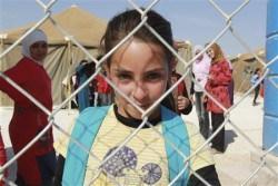 A Syrian refugee girl in Zaatari refugee camp in Jordan (Photo Credit: Reuters) 