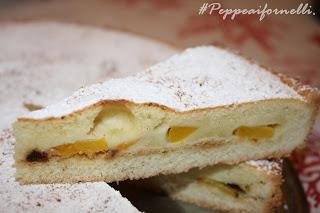 Crostata clafoutis di pesche.